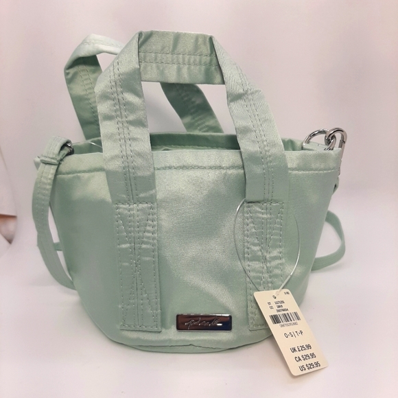 PINK Victoria's Secret Handbags - NWT Victoria's Secret PINK Mini Light Mint Green Drawstring Bucket Crossbody Bag